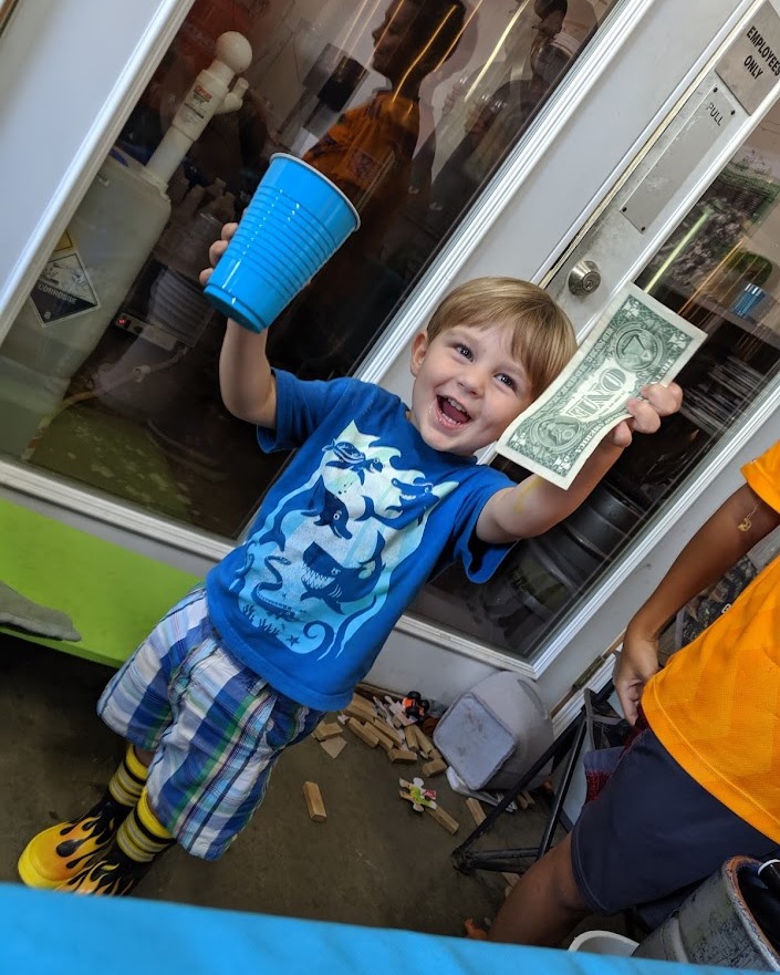 Their first dollar made selling root beer at lemonade day.